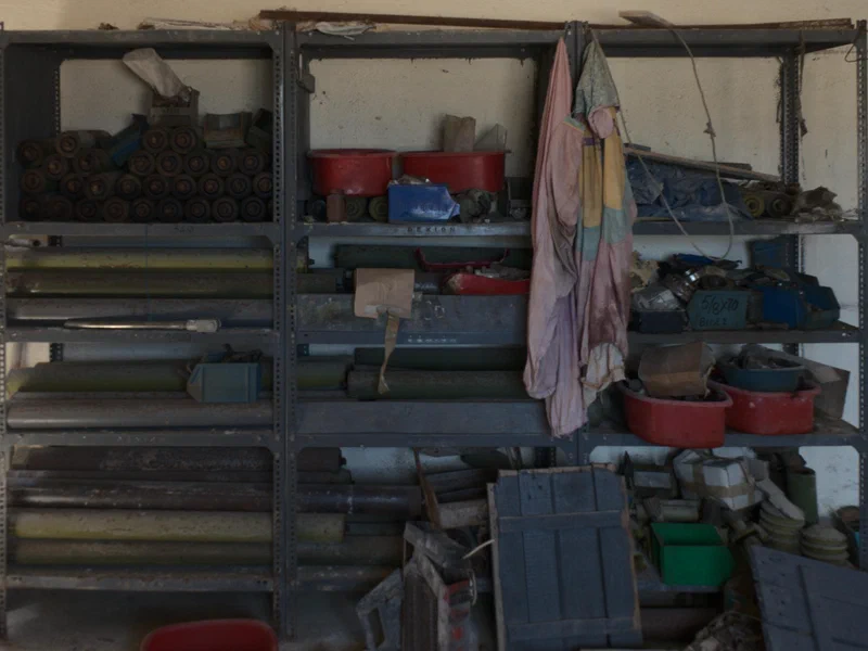 In another corner, supplies are still stacked on shelves.