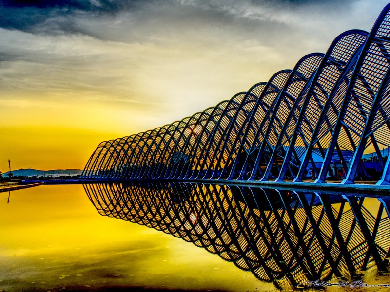The walkway at the Olympic stadium in the sunset, heavily edited to bring out more colours.