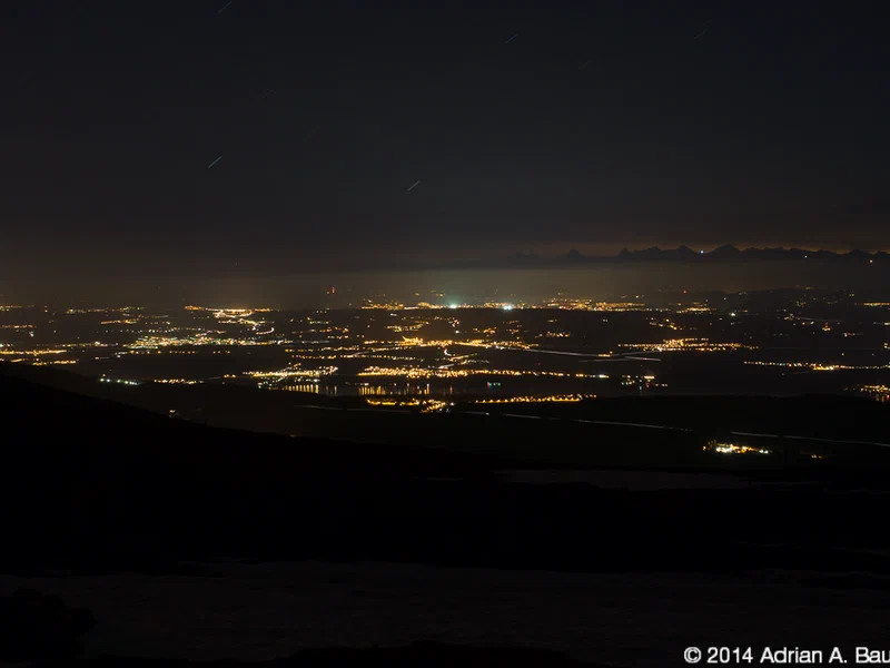 The alps weren't visible with the naked eye anymore, but at about five minutes exposure, they appeared…